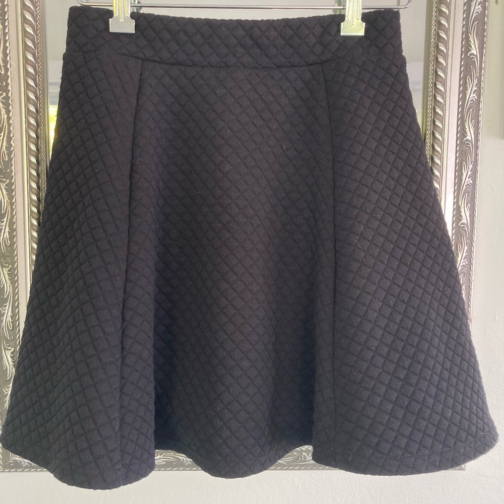 H&M black quilted skirt.